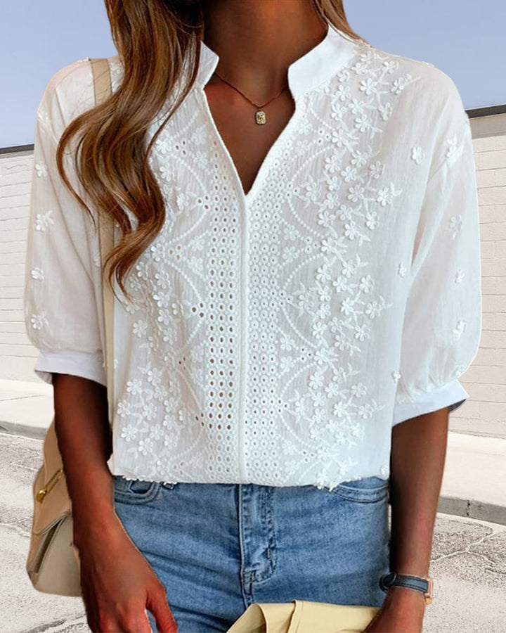 Blouse met V-hals en pofmouwen met kantversiering