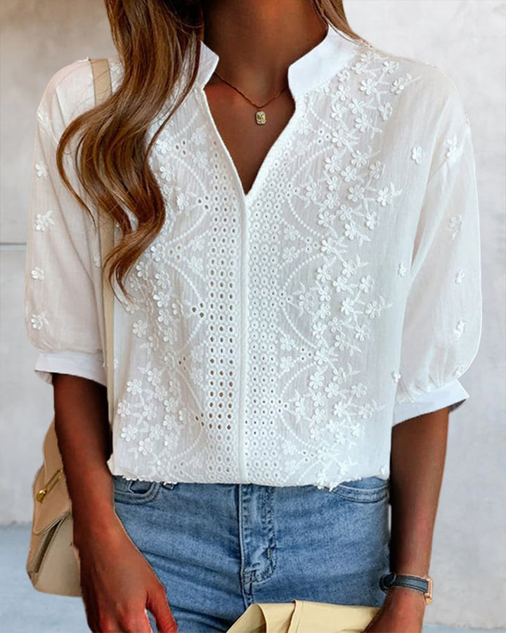 Blouse met V-hals en pofmouwen met kantversiering
