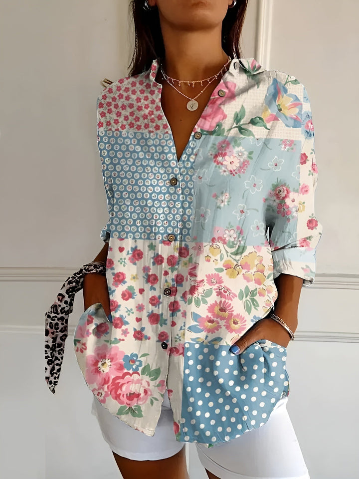 DESIREE I GEBLOMTE BLOUSE MET KNOPENRIJ