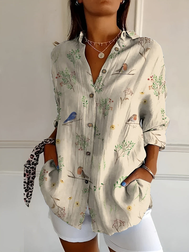 DESIREE I GEBLOMTE BLOUSE MET KNOPENRIJ