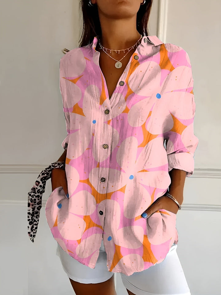 DESIREE I GEBLOMTE BLOUSE MET KNOPENRIJ