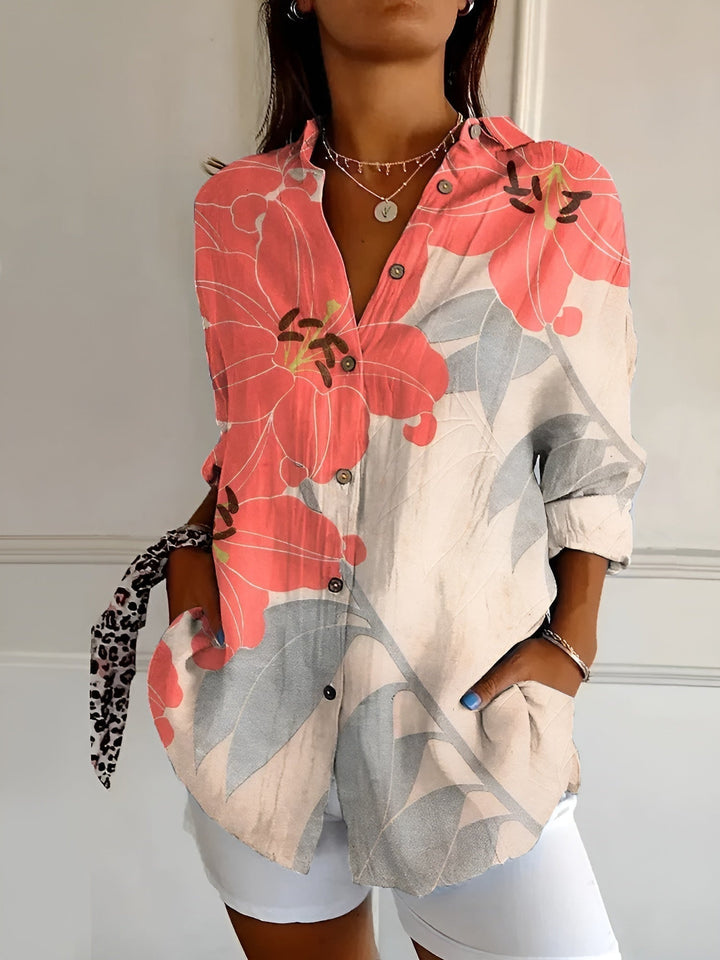 DESIREE I GEBLOMTE BLOUSE MET KNOPENRIJ