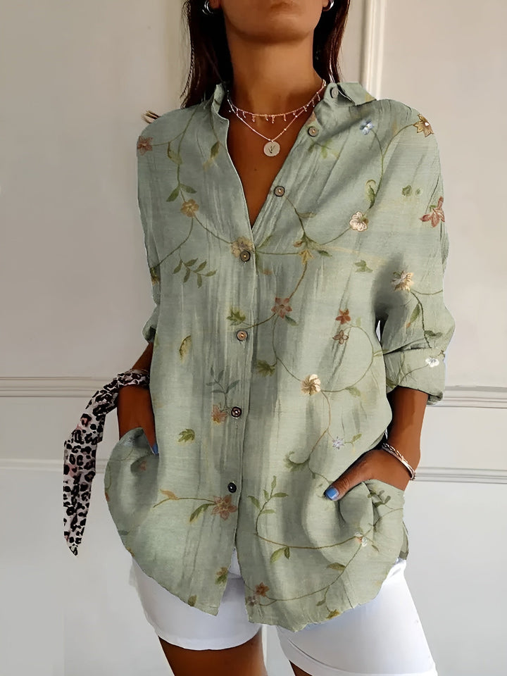 DESIREE I GEBLOMTE BLOUSE MET KNOPENRIJ
