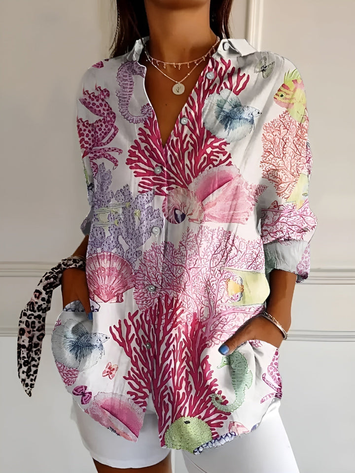 DESIREE I GEBLOMTE BLOUSE MET KNOPENRIJ